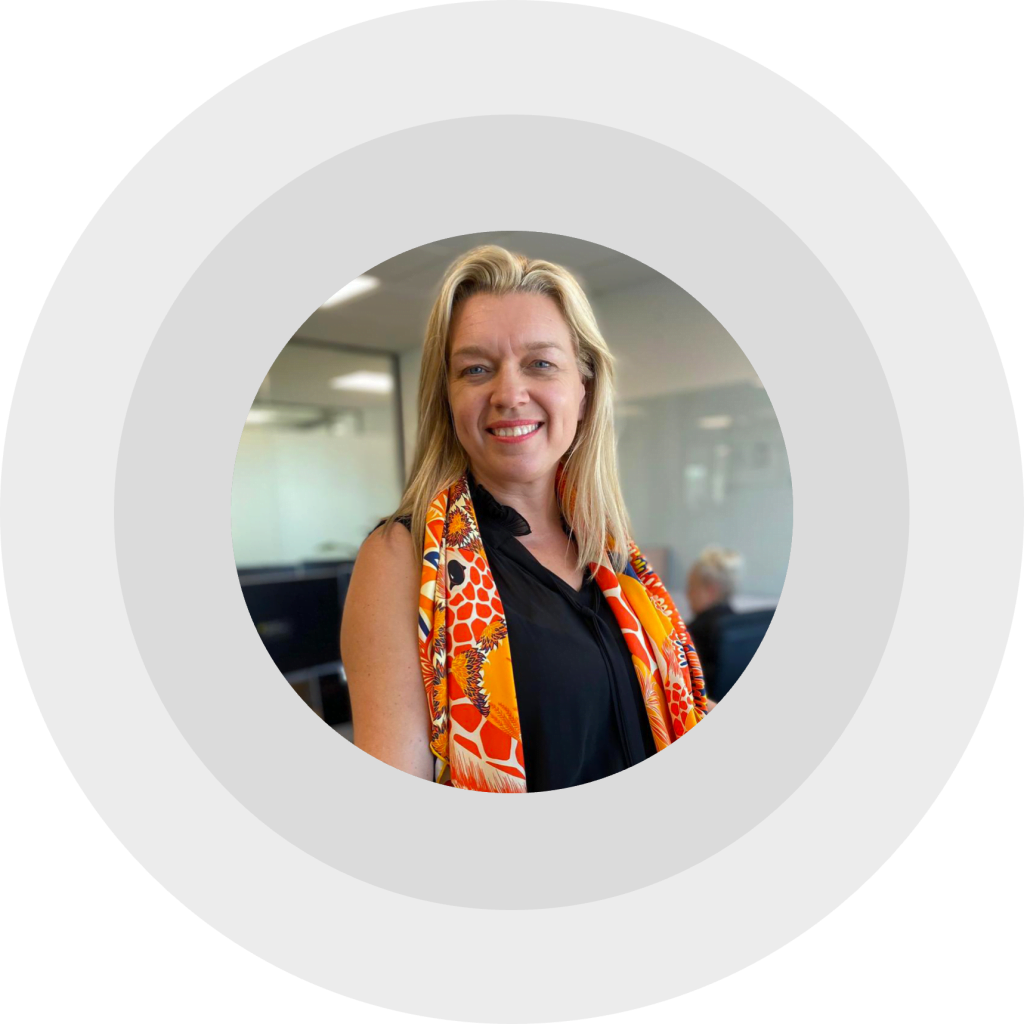 Smiling business leader in office context