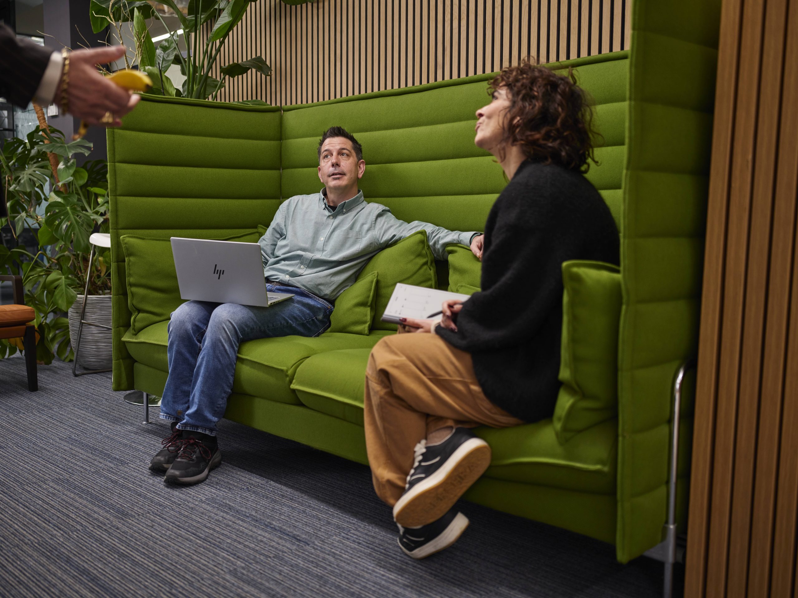 Rob and Christina 1 people on sofa in an office