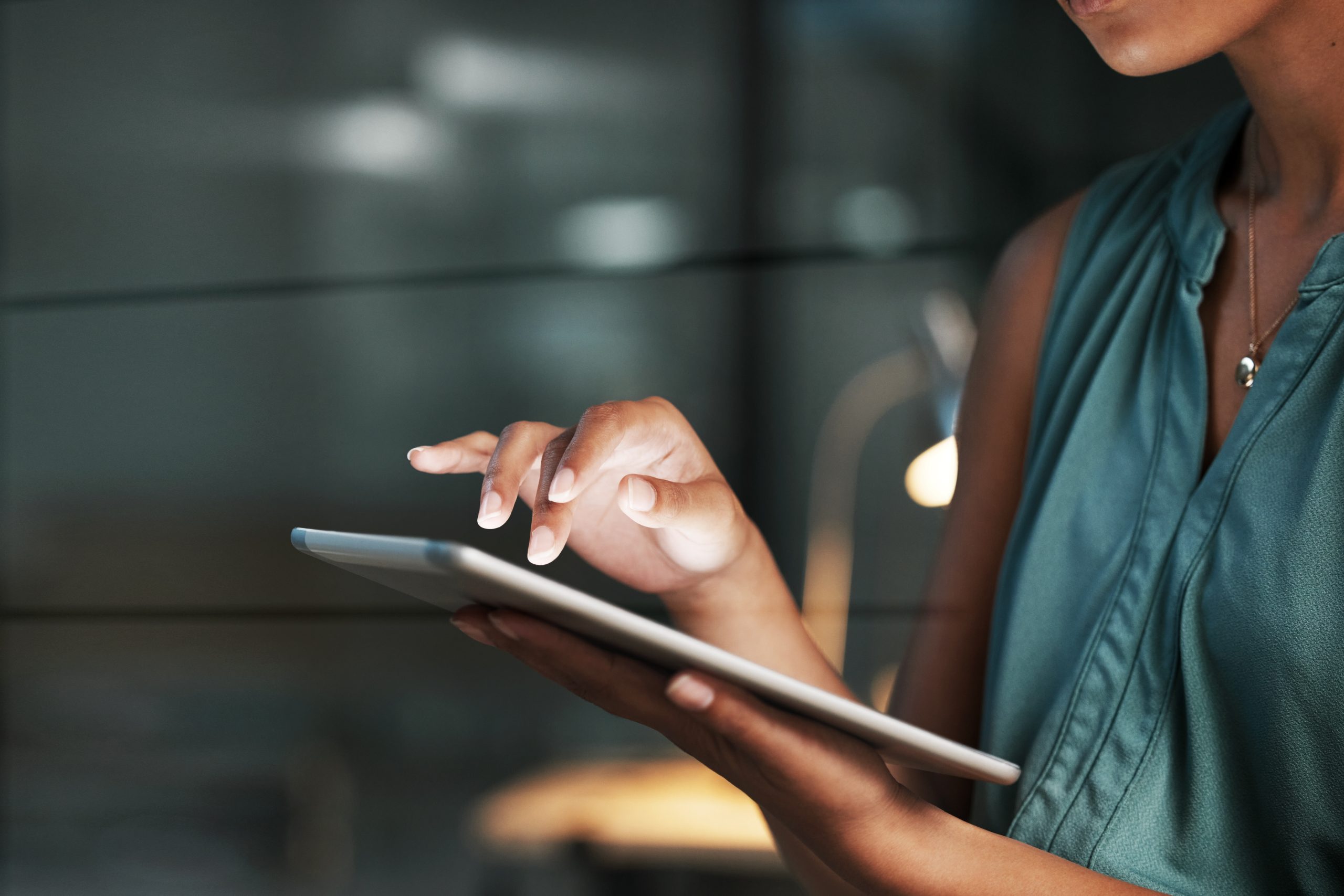 Hands, accountant or black woman at night on tablet for strategy, tax or audit review at a company business. Finance, girl or advisor scroll on tech for planning stock market, invest research.