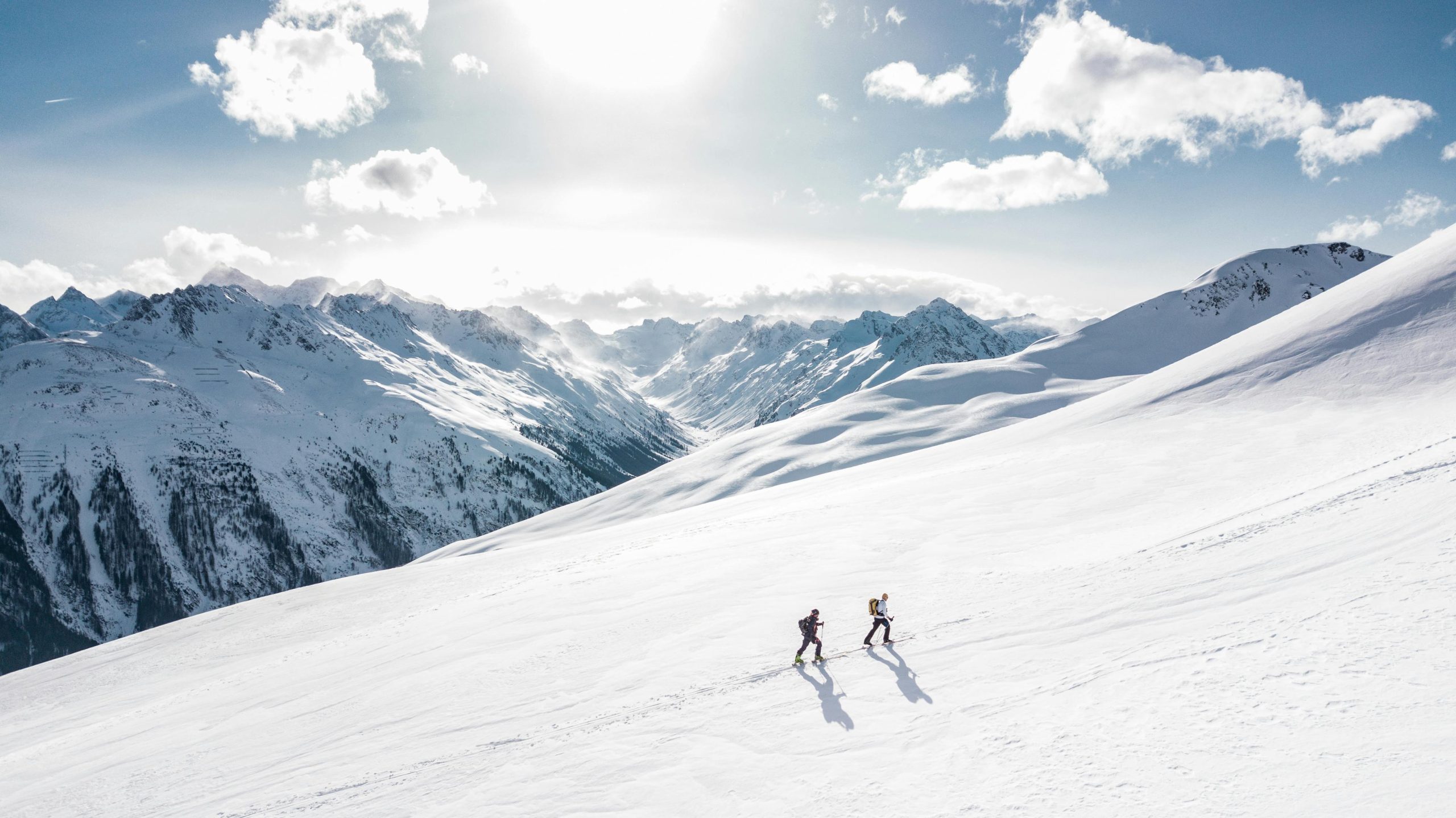 pexels-fmaderebner-869258 people hiking in snow