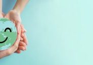 Hands holding earth with smile face, save planet, earth day, environment day, happy world, csr social responsibility, sustainable living  concept