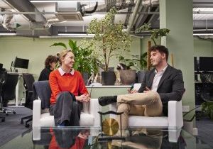 people chatting on armchairs