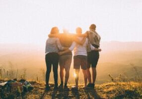 group of friends hugging